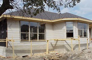 The siding on the back of the house has now been completed and the windows have been installed.