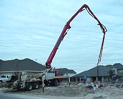 The concrete pump arrives at the location early in the morning.