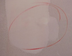 Similar to a school paper that is graded, the walls have been marked with problem spots for the workers to correct.